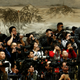 Journalists attend a news conference in Beijing in March.